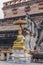 sitting golden buddha infront the old pavillion