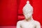 Sitting white Buddha statue mistake in create at temple Thailand