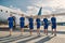 Six attractive female flight attendants going ahead