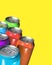 Six colorful drink cans