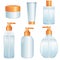 Six cosmetic bottles and tubes with golden covers on white background