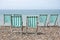 Six Deckchairs Facing Sea