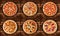 Six different pizza set for menu. Pepperoni, BBQ chicken, pepperoni cut, deluxe, pizza with ham, pizza with salami, ham and bacon