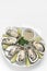 Six fresh oysters with lime wedges and citrus sauce