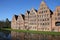 Six historic brick buildings that were used as salt storehouses on the Upper Trave River Lubeck, Germany.