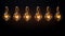 Six illuminated vintage light bulbs in a row