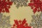 Six large silver and red flat ornate snowflakes are laid out on velvety gold paper. Free space for text. New Year or