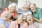 Six Laughing Senior Friends in a living room