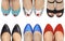 Six pairs of legs in shoes and sandals of different colors.