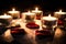 Six Romantic Tealights On Slate With Rose Petals And Leafs