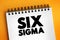 Six Sigma 6Ïƒ - set of techniques and tools for process improvement, text concept on notepad