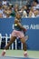 Sixteen times Grand Slam champion Serena Williams during first round doubles match with teammate Venus Williams at US Open 2013