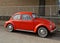 Sixties red model of the famous vintage car Type 1, better known as beetle.