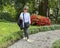 Sixty-five year-old female Korean tourist in the Garden of the Villa Carlotta in Tremezzo.