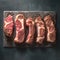 Sizzling beef rib eye steak on slate board, top down culinary perfection