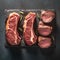Sizzling beef rib eye steak on slate board, top down culinary perfection