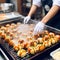 Sizzling Delights: Journey of Cooking Takoyaki - Japan\\\'s Most Popular and Delicious Snack