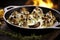 sizzling pan of hen-of-the-woods mushrooms stuffed with havarti