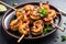 Sizzling plate of grilled shrimp skewers with a tangy garlic and lemon marinade