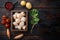 Sizzling seared scallops ingredients, top view, on dark wooden background  with copy space