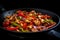 Sizzling Szechuan chicken stir fry with red and green bell peppers, onions, and garlic served on a black cast iron skillet