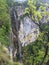 Skaklya waterfall falling from high rocky cliffs