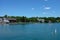 SKANEATELES, NEW YORK - 17 JUNE 2021: Thayer Park and St. James Episcopal Church on Skaneateles Lake seen from the pier