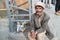 SKARDU, PAKISTAN - JULY 28 : An unidentified old man poses for a portrait as he rests after hard work July 28, 2018 in Skardu