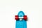 Skateboard cruiser with blue deck and red wheels on isolated white background, top view with copy-space. Concept of sport lifestyl