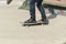 A skateboarder in action doing tricks on ramps at a skate park