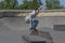 Skateboarder jumping towards the camera