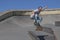 Skateboarder jumping towards the camera