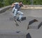 Skateboarder performing a kickflip