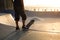 Skateboarder photographed against the light during sunset