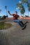 Skateboarder practice on a pump track park