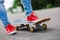 Skateboarder riding skateboard through the street