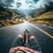 Skateboarder takes an exhilarating ride down a winding country road