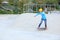 Skateboarders ridng on a skateboard park