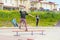 Skateboarding contest in skate park of Pyatigorsk.Young Caucasian skateboarders riding in outdoor concrete skatepark