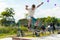 Skateboarding contest in skate park of Pyatigorsk.Young Caucasian skateboarders riding in outdoor concrete skatepark