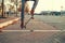 Skateboarding. A man does an Ollie stunt on a skateboard. Board in the air. Close-up of legs