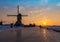 Skater on the frozen canal along the windmills alignment