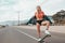 Skater girl in california with camper in the background