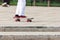 Skater on the skate Board is preparing for the stunt