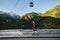 Skater traveling in the mountains on his longboard