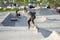 Skaters and bikers practice tricks at an outdoor skatepark during the Corona Virus in Detroit