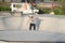 Skaters and bikers practice tricks at an outdoor skatepark during the Corona Virus in Detroit