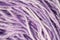 Skein of mix violet purple melange knitting thread close up