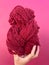 Skein of red yarn dyed with natural dyes of Cochineal insects