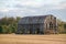 Skeletal remains of an old tobacco barn.